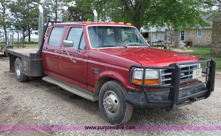 image for item H7500 1997 Ford F350 XLT Crew Cab flatbed pickup truck