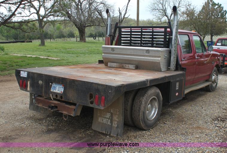 image for item H7500 1997 Ford F350 XLT Crew Cab flatbed pickup truck