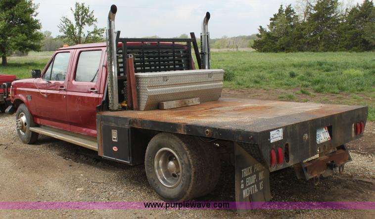 image for item H7500 1997 Ford F350 XLT Crew Cab flatbed pickup truck