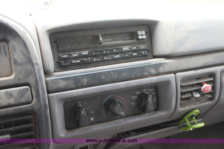 image for item H7500 1997 Ford F350 XLT Crew Cab flatbed pickup truck