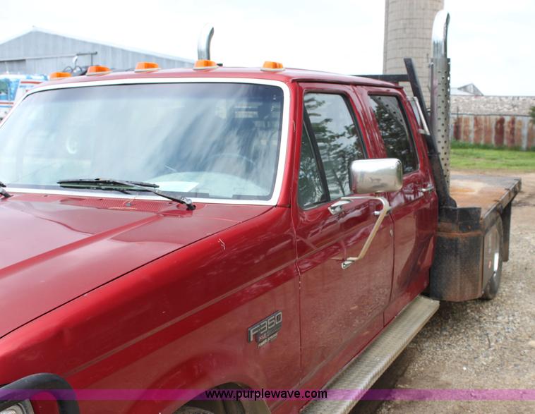 image for item H7500 1997 Ford F350 XLT Crew Cab flatbed pickup truck