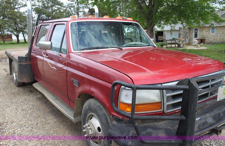 image for item H7500 1997 Ford F350 XLT Crew Cab flatbed pickup truck