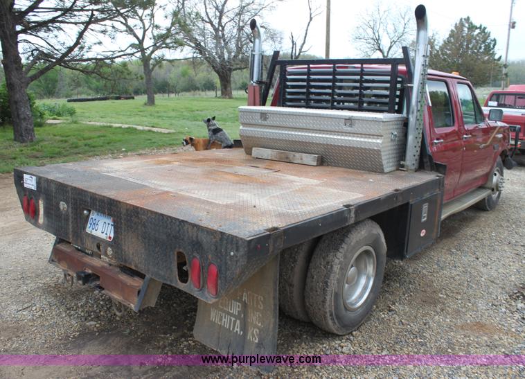 image for item H7500 1997 Ford F350 XLT Crew Cab flatbed pickup truck