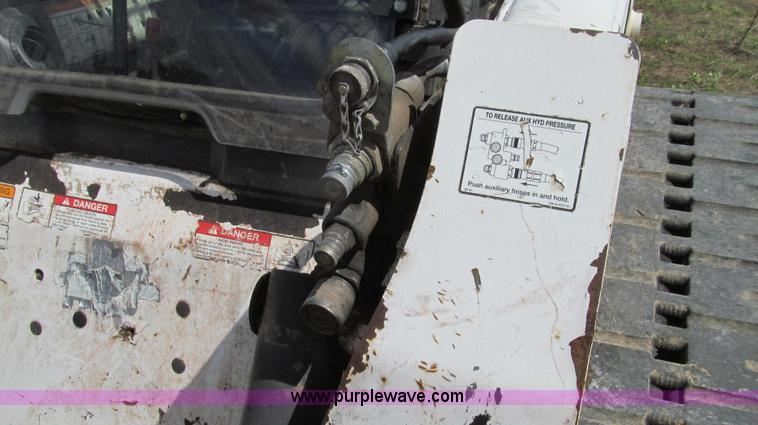 image for item E3909 2003 Bobcat T250 skid steer
