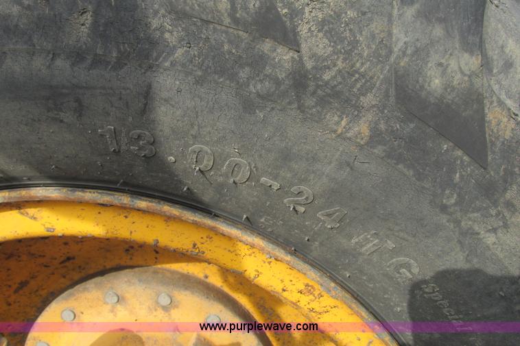 image for item F4820 1988 John Deere 670B articulated motor grader