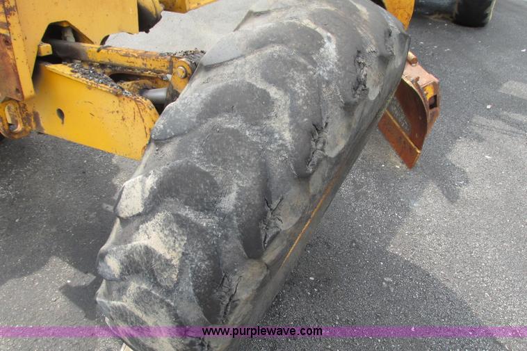 image for item F4820 1988 John Deere 670B articulated motor grader