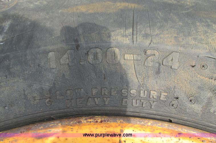 image for item F4820 1988 John Deere 670B articulated motor grader