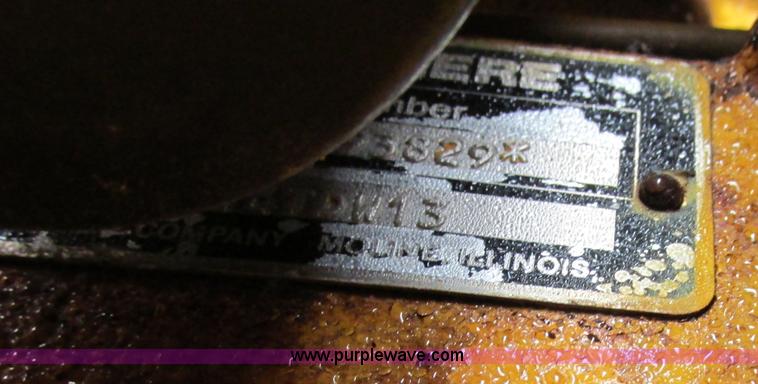 image for item F4820 1988 John Deere 670B articulated motor grader