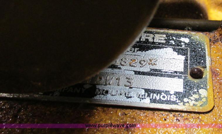 image for item F4820 1988 John Deere 670B articulated motor grader