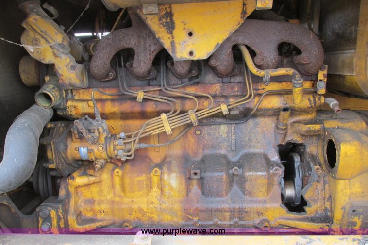 image for item F4820 1988 John Deere 670B articulated motor grader