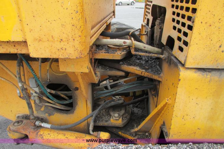 image for item F4820 1988 John Deere 670B articulated motor grader