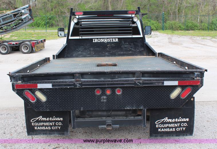 image for item G5404 2008 Dodge Ram 5500 Quad Cab flatbed truck
