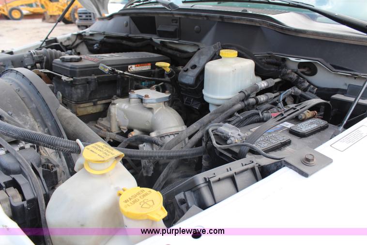 image for item G5404 2008 Dodge Ram 5500 Quad Cab flatbed truck