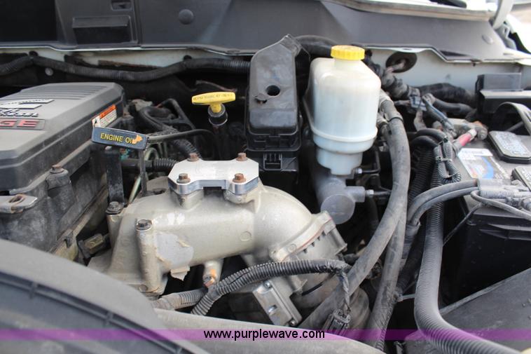 image for item G5404 2008 Dodge Ram 5500 Quad Cab flatbed truck