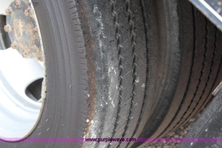 image for item G5404 2008 Dodge Ram 5500 Quad Cab flatbed truck