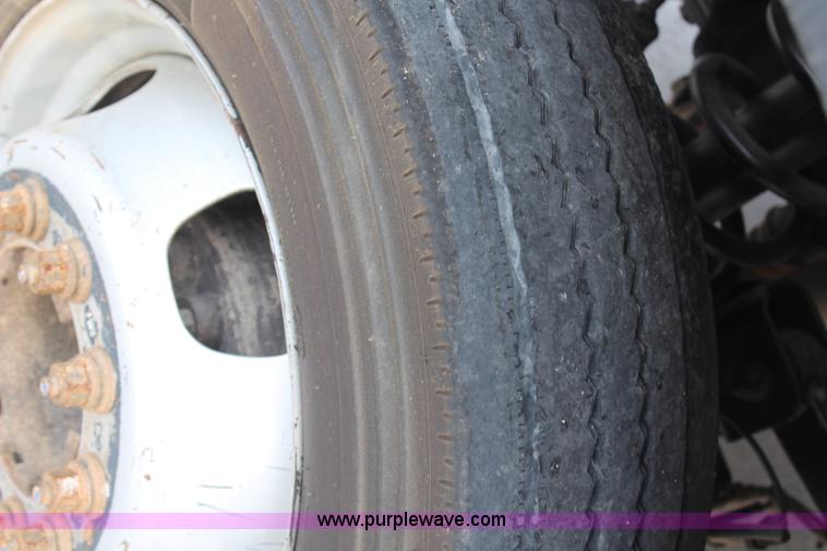 image for item G5404 2008 Dodge Ram 5500 Quad Cab flatbed truck