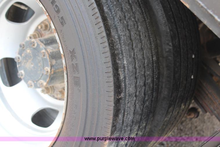 image for item G5404 2008 Dodge Ram 5500 Quad Cab flatbed truck