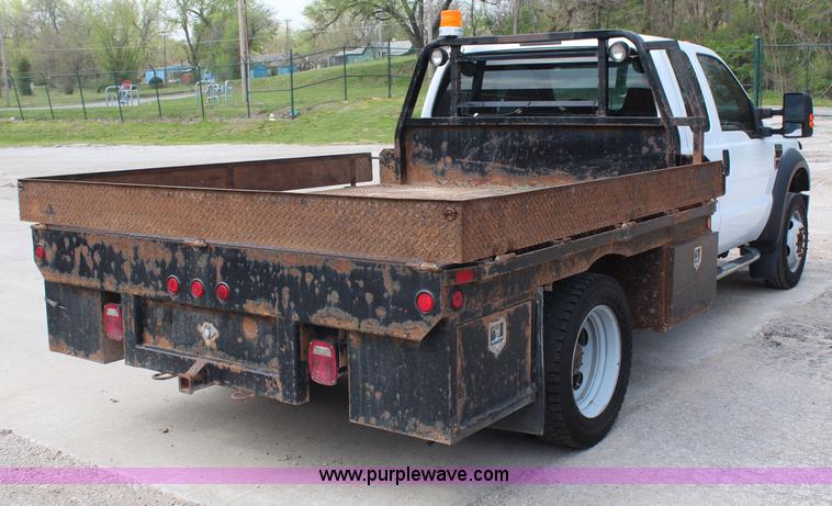 image for item G5411 2008 Ford F450 Super Duty SuperCab flatbed truck