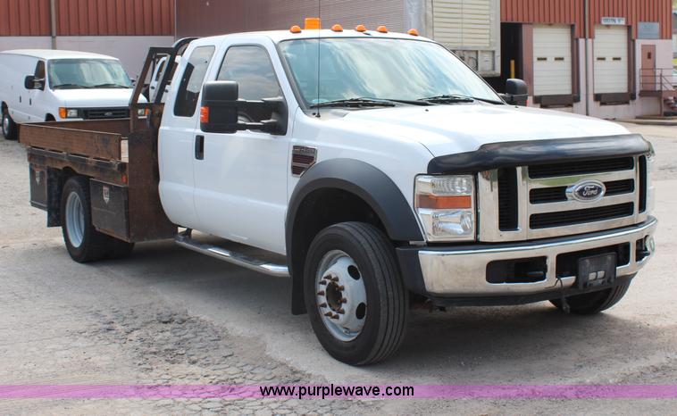 image for item G5411 2008 Ford F450 Super Duty SuperCab flatbed truck