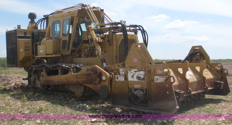image for item D5843 1979 Caterpillar D8K with IronWolf 1040HD Crusher