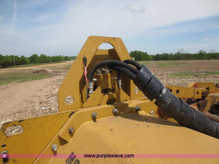 image for item D5843 1979 Caterpillar D8K with IronWolf 1040HD Crusher