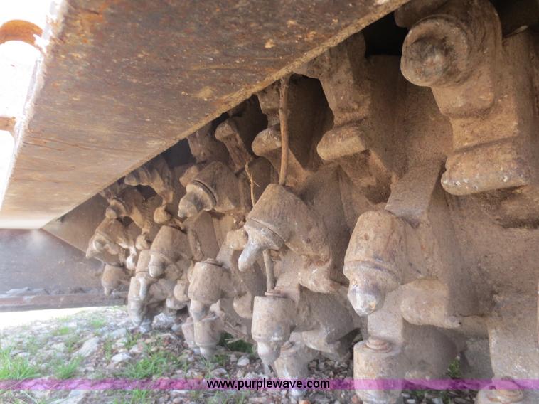 image for item D5843 1979 Caterpillar D8K with IronWolf 1040HD Crusher