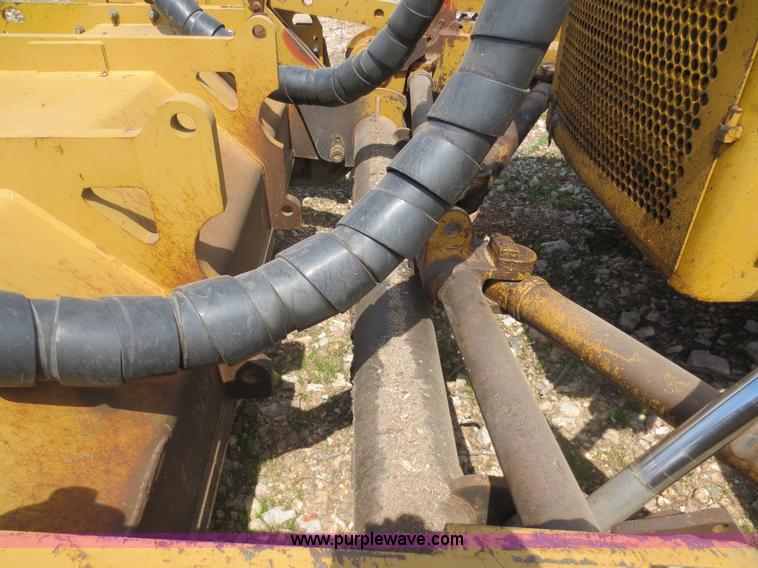 image for item D5843 1979 Caterpillar D8K with IronWolf 1040HD Crusher