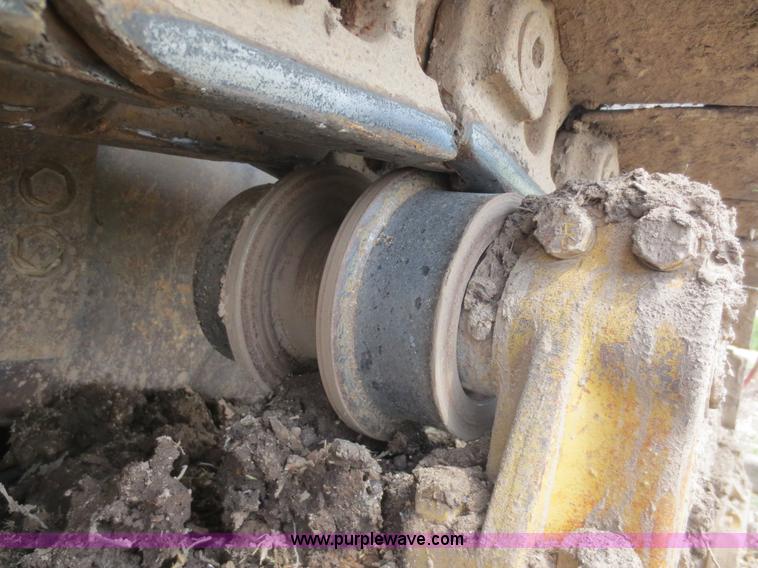 image for item D5843 1979 Caterpillar D8K with IronWolf 1040HD Crusher