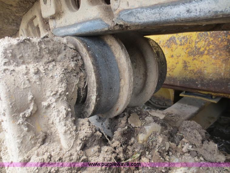 image for item D5843 1979 Caterpillar D8K with IronWolf 1040HD Crusher