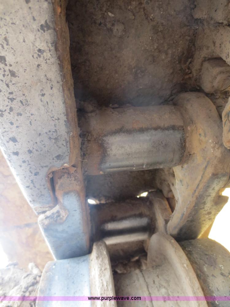 image for item D5843 1979 Caterpillar D8K with IronWolf 1040HD Crusher