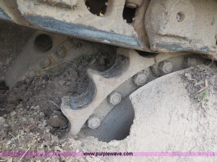 image for item D5843 1979 Caterpillar D8K with IronWolf 1040HD Crusher