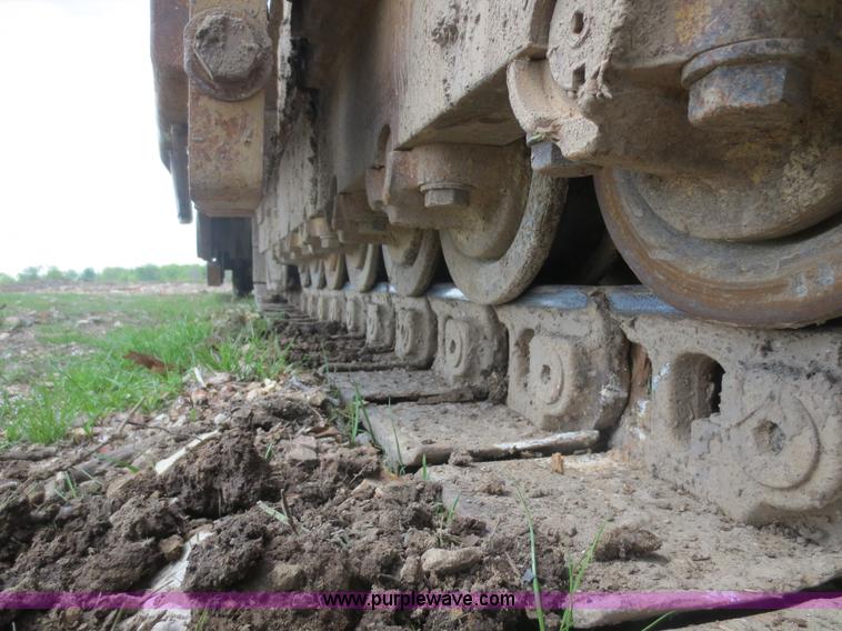 image for item D5843 1979 Caterpillar D8K with IronWolf 1040HD Crusher