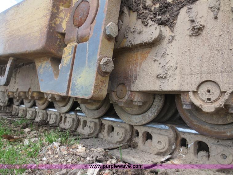 image for item D5843 1979 Caterpillar D8K with IronWolf 1040HD Crusher