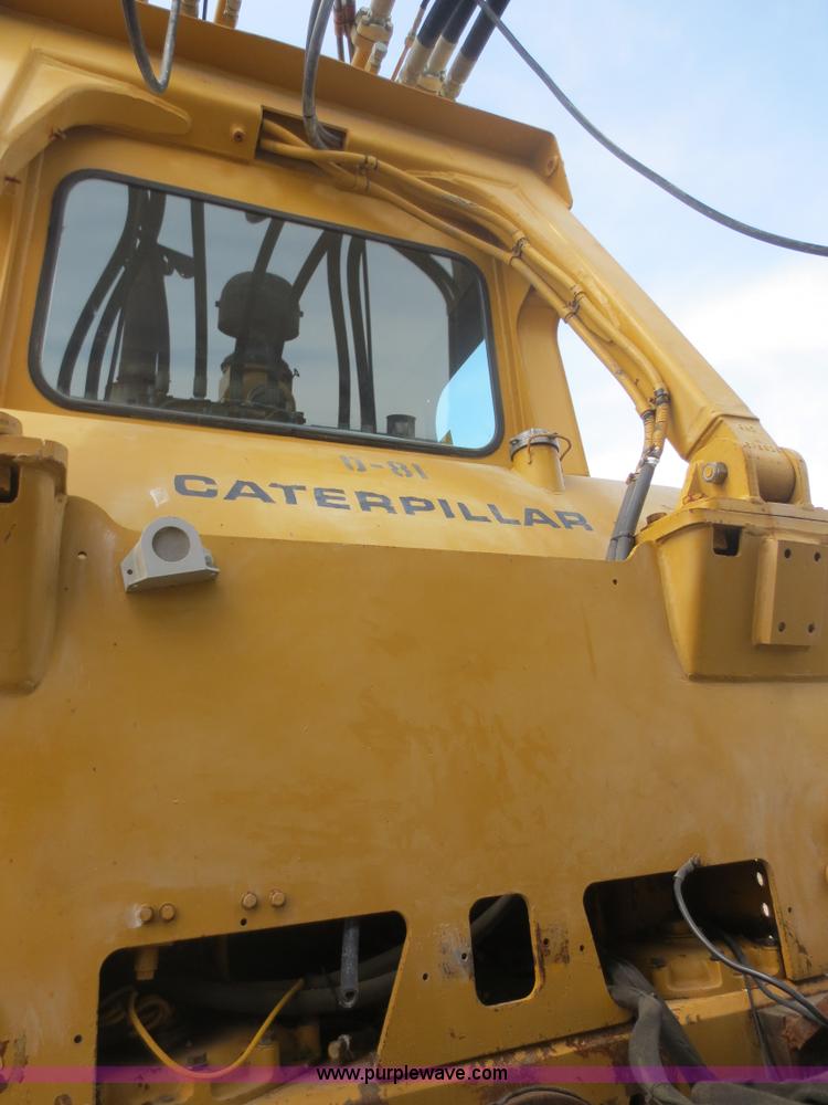 image for item D5843 1979 Caterpillar D8K with IronWolf 1040HD Crusher