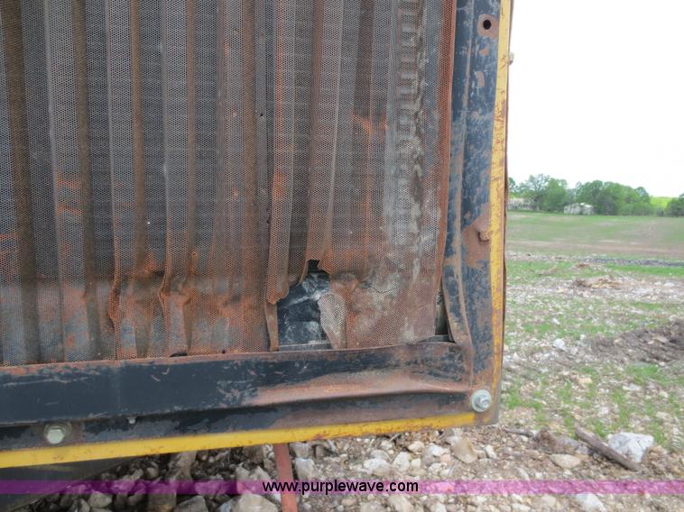 image for item D5843 1979 Caterpillar D8K with IronWolf 1040HD Crusher