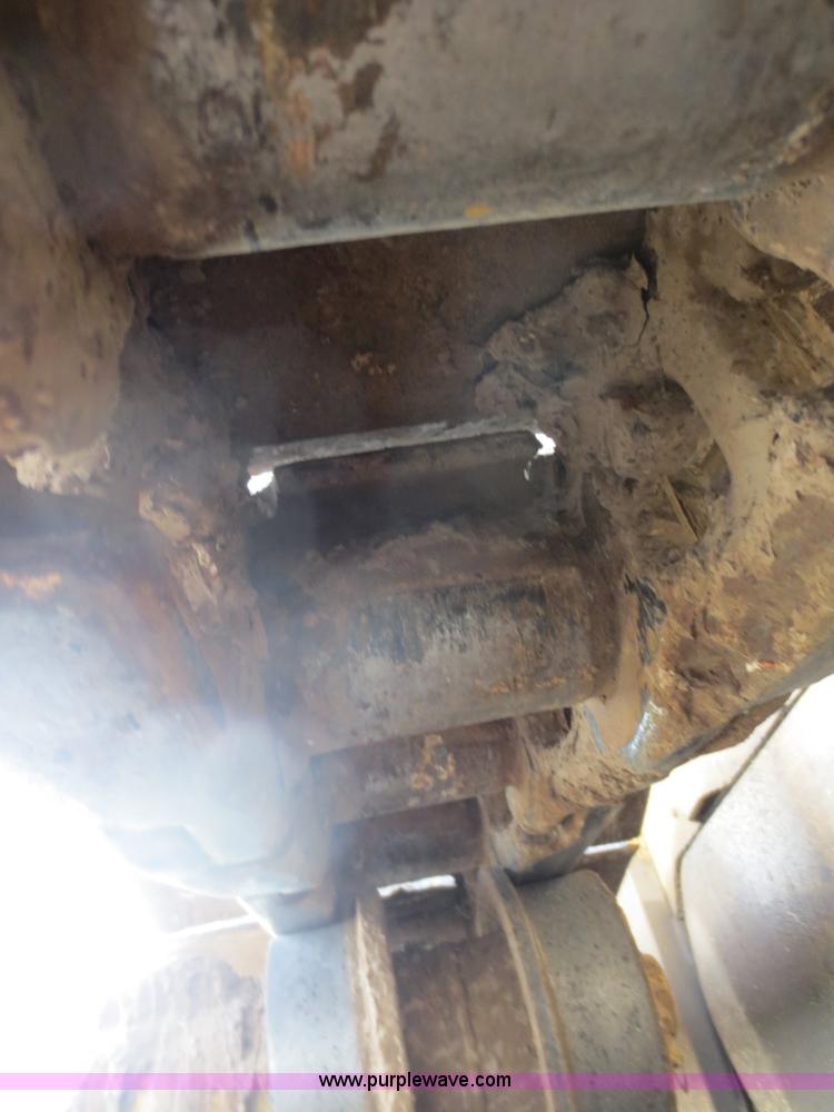 image for item D5843 1979 Caterpillar D8K with IronWolf 1040HD Crusher