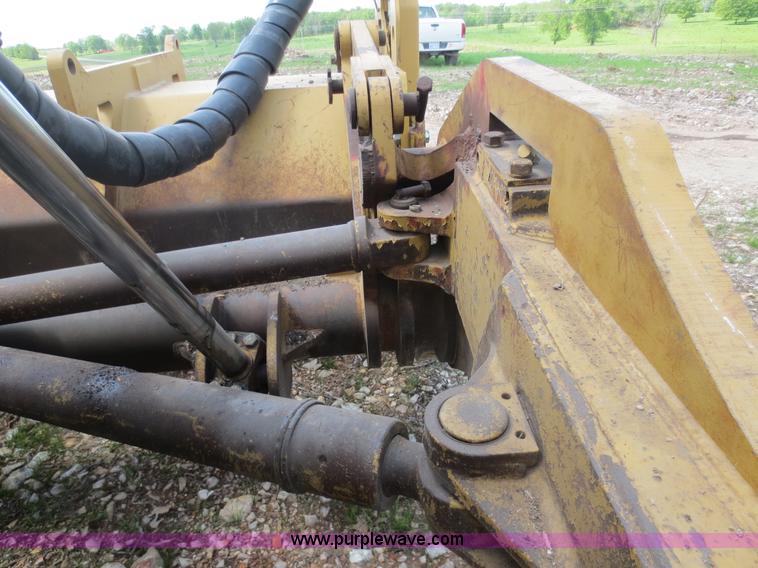 image for item D5843 1979 Caterpillar D8K with IronWolf 1040HD Crusher