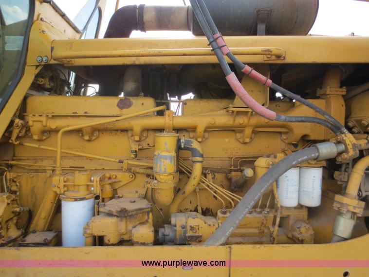image for item D5843 1979 Caterpillar D8K with IronWolf 1040HD Crusher