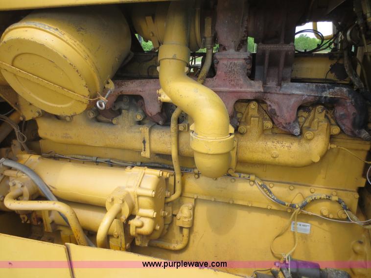 image for item D5843 1979 Caterpillar D8K with IronWolf 1040HD Crusher