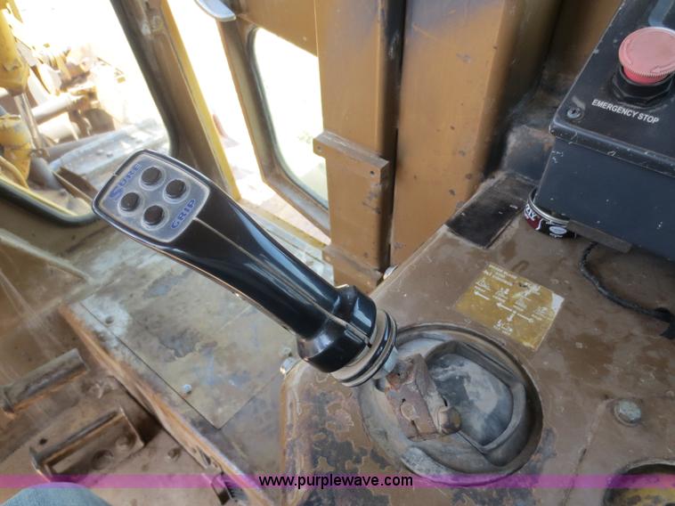 image for item D5843 1979 Caterpillar D8K with IronWolf 1040HD Crusher