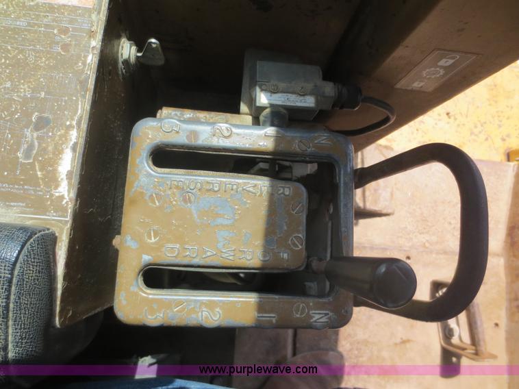 image for item D5843 1979 Caterpillar D8K with IronWolf 1040HD Crusher