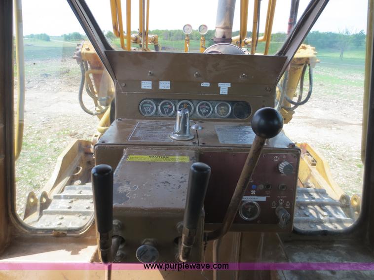 image for item D5843 1979 Caterpillar D8K with IronWolf 1040HD Crusher