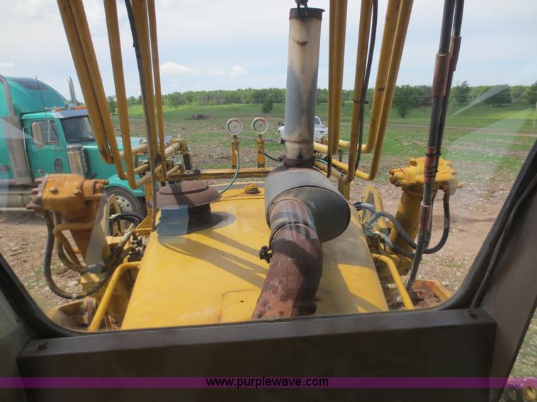 image for item D5843 1979 Caterpillar D8K with IronWolf 1040HD Crusher