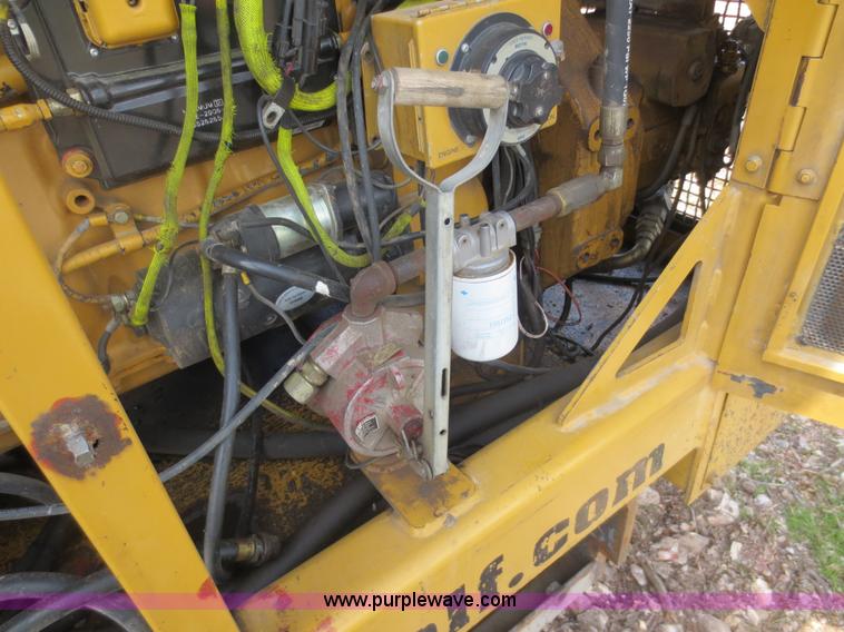 image for item D5843 1979 Caterpillar D8K with IronWolf 1040HD Crusher