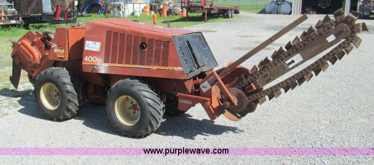 image for item E7546 Ditch Witch 400SXD trencher and vibratory plow