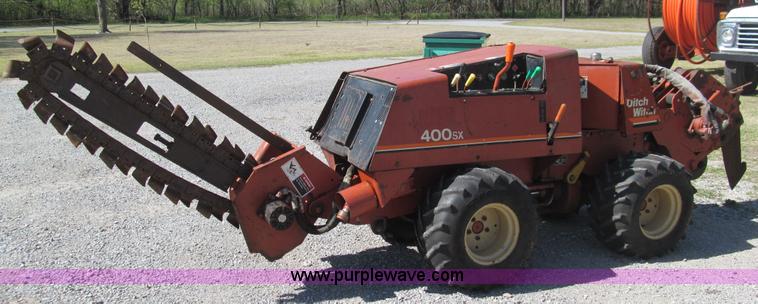 image for item E7546 Ditch Witch 400SXD trencher and vibratory plow