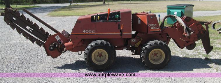 image for item E7546 Ditch Witch 400SXD trencher and vibratory plow