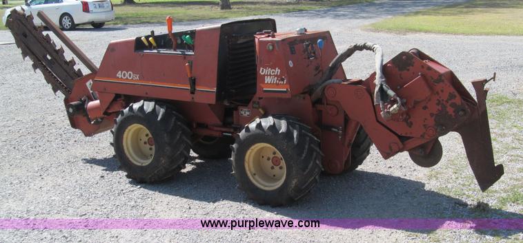 image for item E7546 Ditch Witch 400SXD trencher and vibratory plow