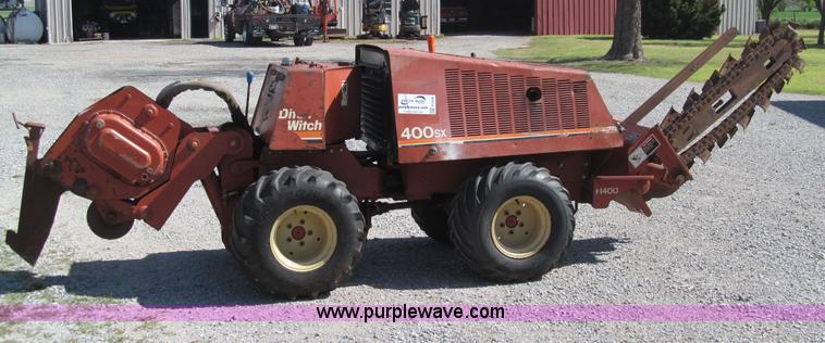 image for item E7546 Ditch Witch 400SXD trencher and vibratory plow