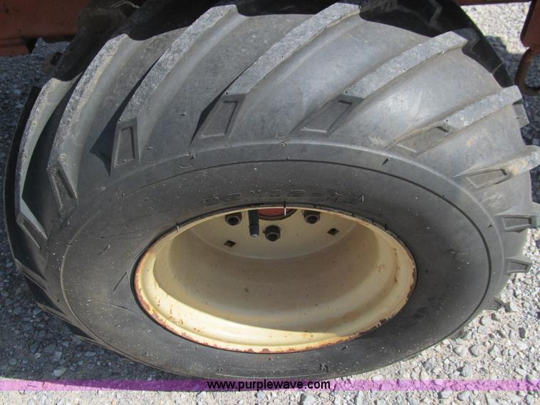 image for item E7546 Ditch Witch 400SXD trencher and vibratory plow